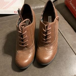 Brown laced heeled booties